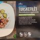 Tradisjonell torskefilét med kalkunbacon og grønnsaker